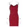 Estilo Europeu e Americano 2025 Novo Outono Feminino Sexy Sexy Decote Halter Costas Nuas Saia Curta Vestido Sexy que Molda o Corpo com Decoração de Gota d'Água no Quadril
