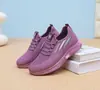 Zapatos de mujer nuevos suela blanda casual deportivos para mujer transpirables de una sola capa zapatos de malla tejida voladora generación de fábrica zapatillas para correr mujer