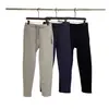 ¡Estilo de pierna cónica! ¡Tejido Toray de capa de aire! Bolsillos con cremallera color liso de moda versátiles pantalones casuales pantalones de chándal pantalones para hombre