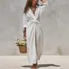 Ropa de mujer transfronteriza europea y americana 2026, vestido largo casual de color liso con cuello de camisa, vestido de punto plisado de manga larga de un solo botón