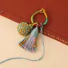 2026 Llavero de Cuerda Multicolor Estilo Étnico Tejido a Mano Multicolor Exquisito Adorno de Bola Colgante para Bolso Accesorios de Borla Venta al por Mayor