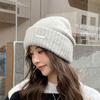 2022 estilo coreano ins Internet celebridade moda pequeno ferro padrão chapéu de lã homens e mulheres casal outono e inverno quente proteção auricular chapéu de malha moda