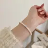 Pulsera de Perlas Shijia para Niña Apilada Doble Capa Redonda Lujo Ligero Nicho Exquisita Pulsera de Perlas Francesas Nuevo Estilo 2025