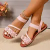 Nuevas sandalias romanas de suela plana con estampado floral para mujer de talla grande para comercio exterior, sandalias de playa ligeras con tira elástica tejida transfronteriza