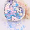 Estrellas huecas sirena flor de cerezo maquillaje de escenario infantil brillo lentejuelas diy material pegamento funda de teléfono móvil lentejuelas 10g
