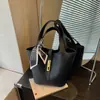 Bolso Estilo Coreano Bolso Cesta de Verduras 2026 Nuevo Moda Verano Bolso Cubo con Patrón de Lichi Bolso Cruzado de Color Sólido de Alto Valor