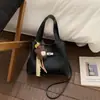 Bolso de Nicho Estilo Coreano Bolso Cubo para Mujer 2025 Invierno Nueva Moda Bolso de Hombro Simple Patrón de Lichi Bolso Cruzado