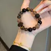 Pulsera de Cristal Natural Oro Negro Super Siete Diseño Original Cristal de Té Moda Versátil Pulsera de Piedra Ojo de Tigre Venta al por Mayor