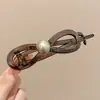 Pinza para el pelo de dibujos animados peculiar con giro para niñas, pinza de garra para el pelo de alta gama para la parte posterior de la cabeza, accesorio para el cabello