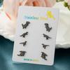 Versión coreana de aretes de dinosaurio pequeños y frescos de acero inoxidable, personalidad Joker, mini aretes, juego de combinación de cuatro pares al por mayor