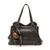 Bolsa Boston Retrô Estilo Coreano Estilo Motociclista Rebites Feminina Chegada Nova Outono/Inverno 2026 Grande Capacidade para o Trabalho Ombro Único Bolsa de Axila