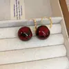 Brincos redondos com gotas de óleo estilo Maillard, luxo leve, alta qualidade, modernos, ear cuffs simples, elegantes e versáteis, brincos de nicho para mulheres