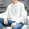 Camiseta casual versátil de manga larga para hombre para otoño, cuello redondo, color liso moderno, cómoda, transpirable y de corte holgado.