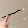 Accesorio de horquilla de alta gama de nicho 2026 nuevo para mujer, estilo antiguo, horquilla de nuevo estilo chino, horquilla minimalista moderna para la parte trasera de la cabeza