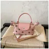 Bolsa de mão de bolinhas da moda, bolsa de ombro de nicho com fecho de fivela para mulheres, moderna, estilosa, fresca, casual, versátil bolsa transversal para ombro