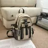 Mochila de moda nueva y moderna para mujer estilo coreano, diseño de nicho, bolsa casual para viajes al aire libre, mochila ligera de nailon para mujer