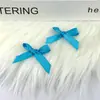 Lazo transfronterizo en stock, lazo de cinta de poliéster doble cara de 1 cm para accesorios para el cabello, ropa, cajas de regalo, juguetes, zapatos y sombreros