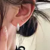Arete de Clip para Oreja de Estrella Asimétrica de Seis Puntas para Mujer Lujo Ligero Nicho Sentido de Alta Gama Pendientes de Estrella Diseño Único Pendiente Versátil Estilo Nuevo