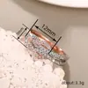 Anillo Elegante de Dos Tonos Cao Shi Metal Electrochapado para Mujer Circonita Microincrustada Anillo de Moda Joyería con Diseño de Cuerda Anudada