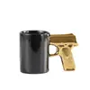 Taza de Café Cerámica con Mango de Pistola _ Taza Negra Única de 350ml con Mango Dorado de Pistola _ Divertida para Amantes de las Armas