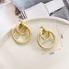 Pendientes de moda de comercio exterior pendientes de metal de moda pendientes anillo de anillo hueco geométrico multicapa pendientes femeninos ins