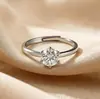 Anillo de seis garras de plata de ley s925 de imitación en stock, anillo de compromiso para pareja de mujer con moissanita de color D transfronterizo, lujo ligero con una sensación de alta gama