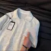 Camiseta tipo polo de punto de manga corta con cuello de gaviota estilo americano de colores para hombres y mujeres, diseño de verano con un toque de alta gama