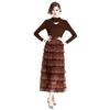 Comercio exterior Zhou Xiu conjunto de dos piezas para otoño e invierno: suéter ajustado de manga larga + falda de malla con cintura elástica