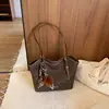 Bolsa Feminina Grande Capacidade Elegante para o Dia a Dia 2026 Outono Inicial Nova Bolsa de Ombro Único Bolsa Tote de Mão Tendência de Alto Estilo