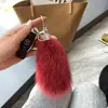 Chaveiro de carro de pele de raposa, pingente de bolsa de pele real, enfeite de pendurar de pelúcia, decoração de cauda fofa, acessório de chaveiro personalizado e estiloso