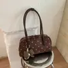 Bolso de hombro de moda estilo coreano con lunares Shuai Mijia 2026 otoño nuevo de gran capacidad para el trabajo bolso Boston exquisito