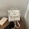 Mochila feminina de temperamento doce e fofo, estilo coreano, moderna e versátil, bolsa de ombro pequena elegante com renda de bolinhas para viagens e deslocamento