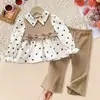 Comercio Exterior Ropa Infantil Primavera y Otoño Conjunto Bebé Dulce Camisa de Cuello Alto con Estampado de Corazones Chaleco + Pantalones Largos Acampanados Amigables con la Piel Conjunto de Dos Piezas
