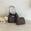 2026 Nova Moda Bolsa Saco com Textura Trançada Casual Chique Bolsa de Mão Simples Bolsa de Ombro Único Transversal Cor Sólida com Textura