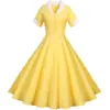 Comercio exterior transfronterizo estilo Hepburn retro europeo y americano verano nuevo traje de manga corta con cuello de solapa vestido casual de color liso acampanado