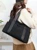 Bolsa de Ombro de Nylon Transfronteiriça 2025 Inverno Nova Bolsa Tote Leve Cor Sólida Tendência Grande Capacidade Bolsa Feminina
