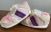 Zapatos sucios para hombre y mujer, un par de cono de felpa peluda, zapatos de invierno raros de algodón de coco, zapatillas divertidas de algodón Aj, venta al por mayor