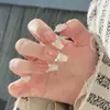 Armadura de mano sentido avanzado hecho a mano ins explosiones diamante roto mariposa uña piezas de uña al por mayor uñas portátiles