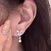 Brincos metálicos simples e versáteis estilo coreano com um toque elegante e sofisticado, populares para o dia a dia, ear cuffs de círculo geométrico e acessórios de orelha