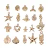 Colgantes de aleación de zinc con forma de concha de oro KC mezclado, estrella de mar, caracola, accesorios para pulsera de colgantes hechos a mano para DIY