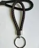 Llavero de cuerda de cuero accesorios de llave tejidos llavero metálico llavero colgante para llave de coche accesorios para bolso