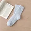 Calcetines de vellón de coral sin pelusa transfronterizos para hombre y mujer, calcetines de vellón de color liso, media caña, cálidos para dormir, calcetines de piso