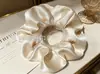 Moderna y de Alta Gama Gomas para el Cabello de Satín con un Diseño Elegante y Brillante de Alta Elasticidad. Suministro al por mayor. Venta directa del fabricante
