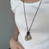 Otoño e Invierno Marrón Maillard Collar Desgastado con Borla Diseño Largo de Nicho Cadena para Suéter Accesorios Simples y Versátiles