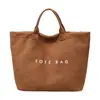 Bolso Tote de Moda de Nicho Transfronterizo para Mujer 2025 Invierno Nuevo de Moda Gran Capacidad Ligero Bolso de Mano para Viaje