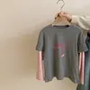 Conjunto de Pantalones Vaqueros Casuales Simples Versátiles de Dos Piezas Elásticos Holgados para Niñas, Estilo Primavera y Otoño, Moderno