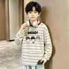 Camiseta de manga larga a rayas de retazos de algodón puro para niños 2026 primavera y otoño casual versátil camiseta base para niños y niños mayores moderna