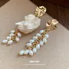 Pendientes de Borla de Perla de Caracol de Concha de Aguja Plateada Pendientes de Botón Estilo Retro Francés de Corte Lujo Ligero Sensación de Alta Gama Adornos para la Oreja Venta al por Mayor