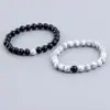 Suministro de joyería popular transfronterizo pulsera de roca volcánica de 8MM y turquesa blanca pulsera de pareja