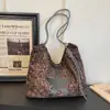 Bolso grande de leopardo para mujer, nuevo bolso tote ligero de otoño 2026 para la escuela y el trabajo, bolso de hombro de gran capacidad